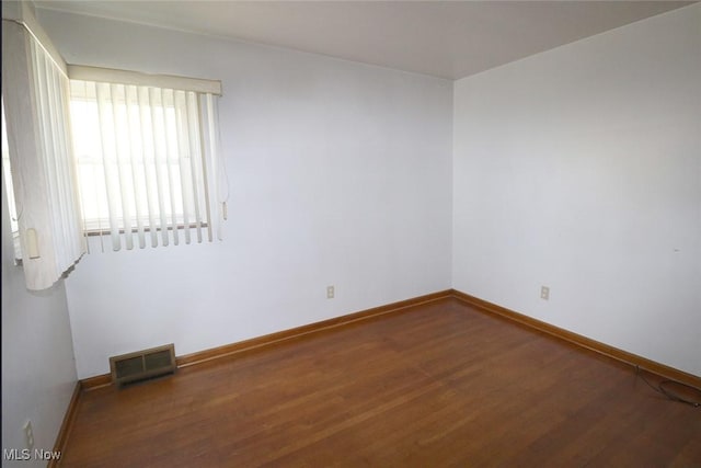 417 Logan Ave, Mingo Junction, OH 43938 - unfurnished room featuring wood finished floors and baseboards
