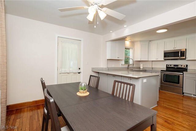 260 Morgan, Oberlin, OH 44074 - dining space with light wood-style floors, ceiling fan, and recessed lighting