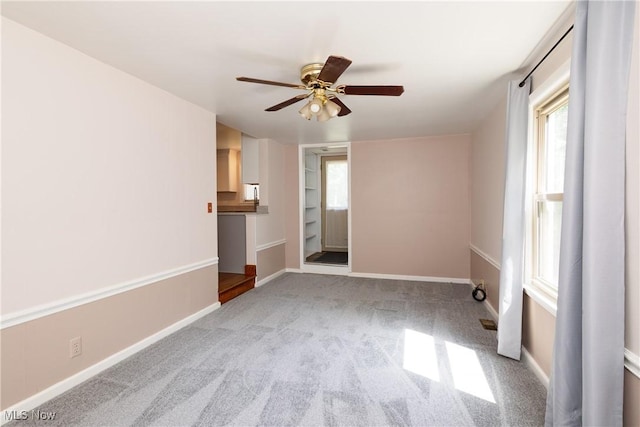 260 Morgan, Oberlin, OH 44074 - unfurnished living room featuring a ceiling fan and carpet floors