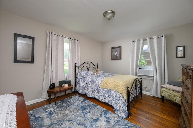 1209 Oak Ave SE, Massillon, OH 44646 - bedroom featuring cooling unit and wood finished floors