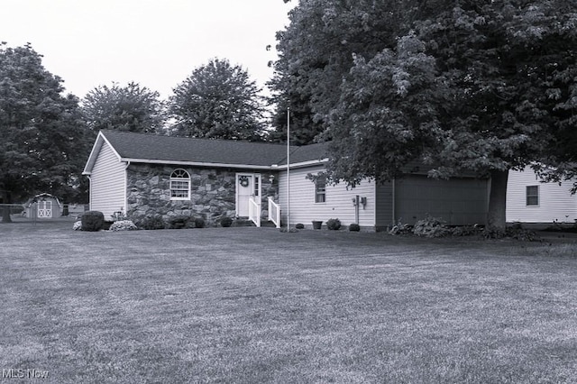 456 Hickory Ln, Salem, OH 44460 - single story home featuring stone siding, an attached garage, asphalt driveway, and roof with shingles