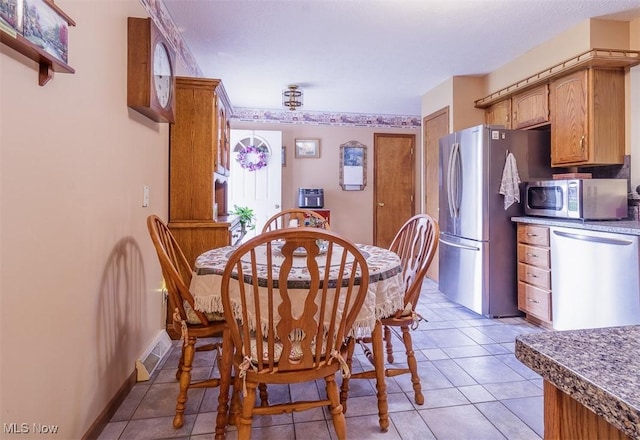 456 Hickory Ln, Salem, OH 44460 - dining room featuring light tile patterned flooring