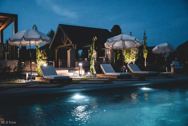 7363 Kempton Ct, Canfield, OH 44406 - pool at twilight with an outdoor pool and a patio area