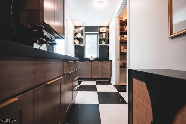 7363 Kempton Ct, Canfield, OH 44406 - kitchen with dark brown cabinetry and open shelves