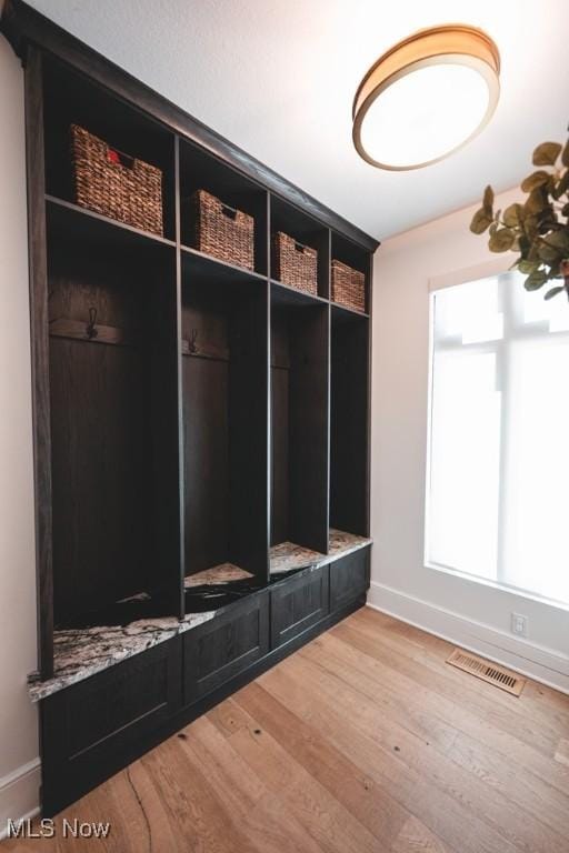 7363 Kempton Ct, Canfield, OH 44406 - mudroom with baseboards and light wood-type flooring
