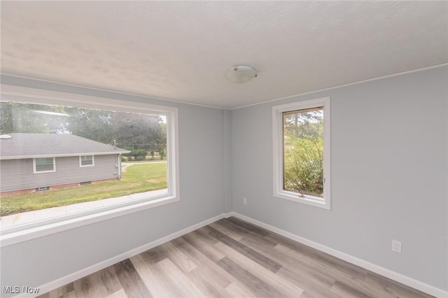 6114 Crossview Rd, Seven Hills, OH 44131 - unfurnished room with wood finished floors and baseboards