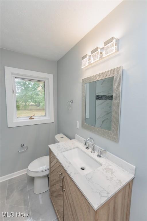 6114 Crossview Rd, Seven Hills, OH 44131 - bathroom featuring vanity and toilet
