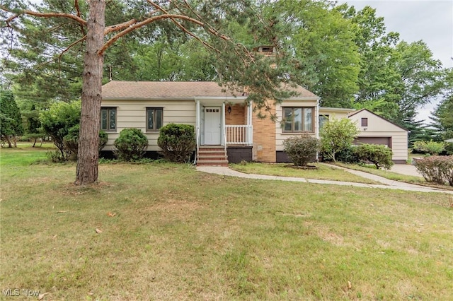6114 Crossview Rd, Seven Hills, OH 44131 - view of front of home with a front lawn, a porch, and an attached garage