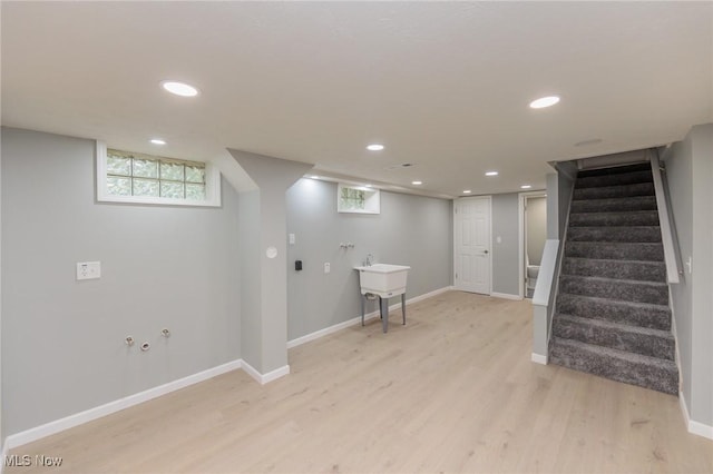6114 Crossview Rd, Seven Hills, OH 44131 - below grade area featuring light wood-type flooring, stairway, and recessed lighting