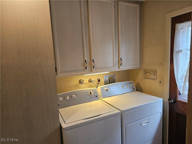 145 Edgewood Dr, Berea, OH 44017 - washroom with separate washer and dryer and cabinet space
