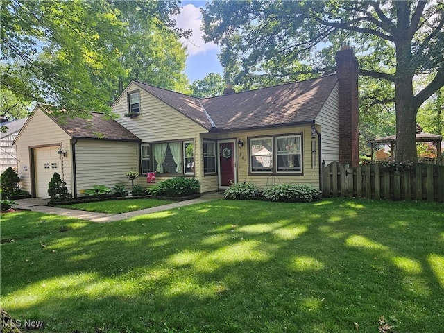 145 Edgewood Dr, Berea, OH 44017 - view of front of home with a chimney, a garage, and a shingled roof