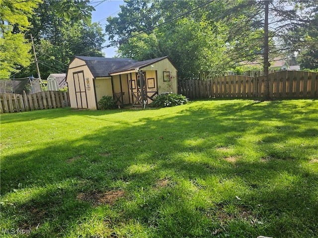 145 Edgewood Dr, Berea, OH 44017 - fenced backyard featuring a shed