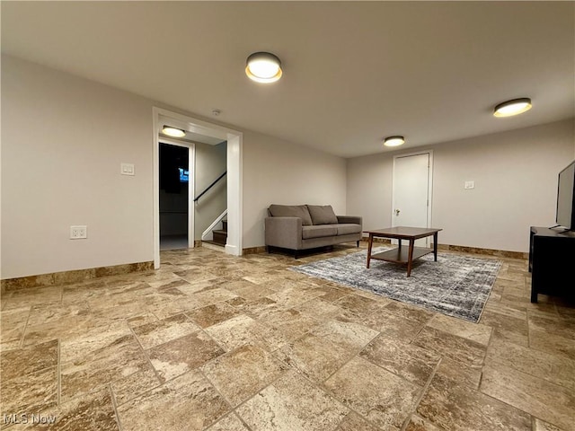 2337 Charney Rd, University Heights, OH 44118 - living area featuring stone finish flooring and stairway