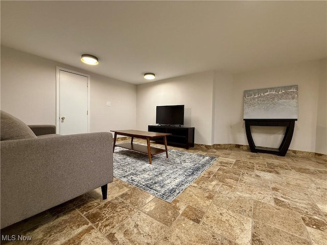 2337 Charney Rd, University Heights, OH 44118 - living room featuring stone tile flooring