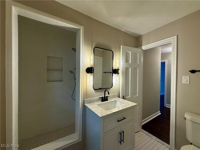 2337 Charney Rd, University Heights, OH 44118 - bathroom featuring a stall shower, vanity, and tile patterned floors