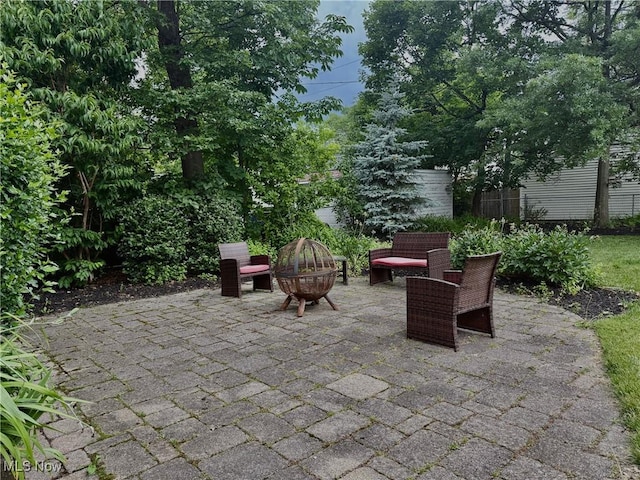 2337 Charney Rd, University Heights, OH 44118 - view of patio / terrace featuring an outdoor fire pit