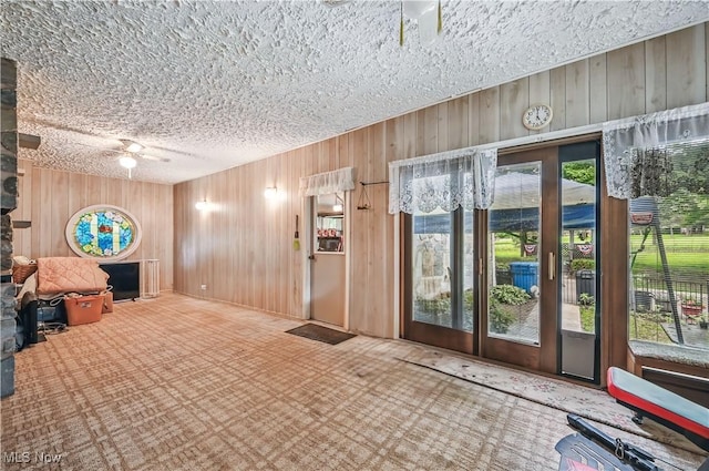 2717 Niles Vienna Rd, Niles, OH 44446 - common area with wooden walls and a textured ceiling