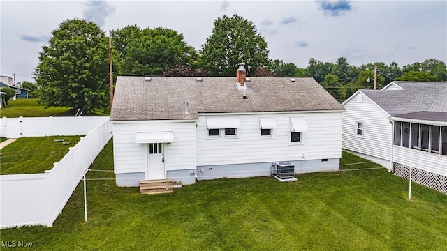 3606 Liberty St, Parkersburg, WV 26104 - back of house featuring a fenced backyard, a chimney, roof with shingles, and crawl space