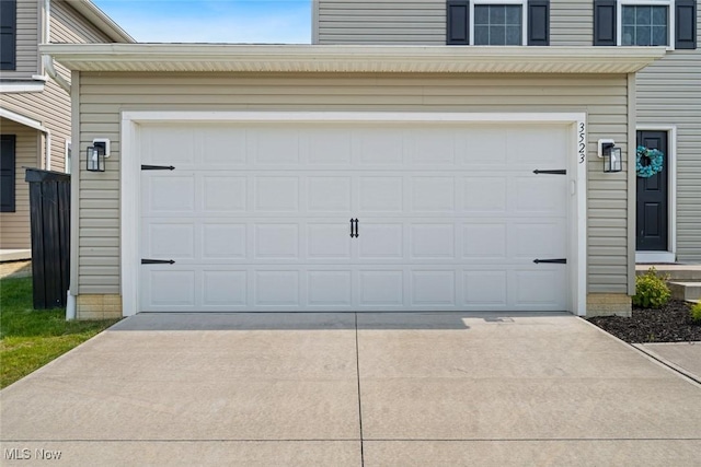 3523 Magnolia Dr, Lorain, OH 44053 - garage with concrete driveway
