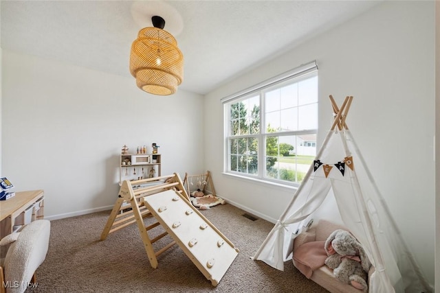 3523 Magnolia Dr, Lorain, OH 44053 - rec room featuring carpet floors and baseboards