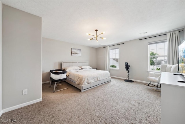 3523 Magnolia Dr, Lorain, OH 44053 - bedroom with a chandelier and carpet flooring