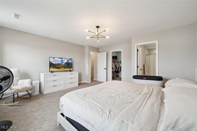 3523 Magnolia Dr, Lorain, OH 44053 - bedroom featuring light carpet, a chandelier, a spacious closet, and a closet