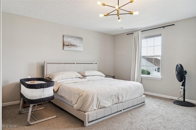 3523 Magnolia Dr, Lorain, OH 44053 - bedroom featuring a chandelier and carpet flooring