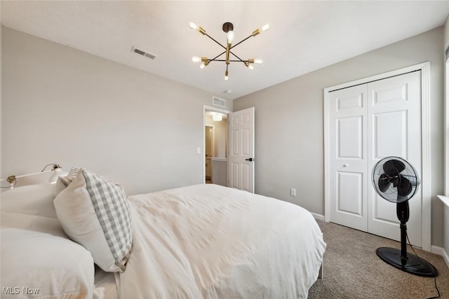 3523 Magnolia Dr, Lorain, OH 44053 - bedroom with carpet, a chandelier, and a closet