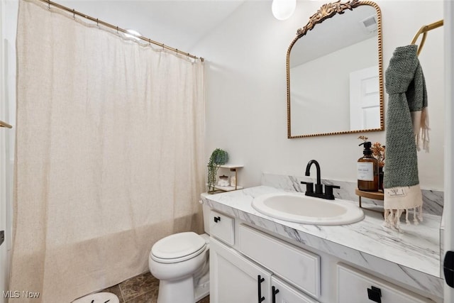3523 Magnolia Dr, Lorain, OH 44053 - full bathroom featuring vanity, shower / bath combo, and tile patterned floors