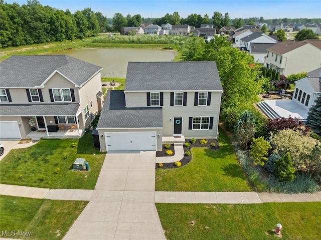 3523 Magnolia Dr, Lorain, OH 44053 - aerial perspective of suburban area featuring a large body of water