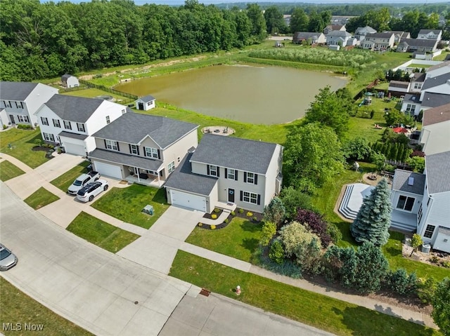 3523 Magnolia Dr, Lorain, OH 44053 - aerial perspective of suburban area with a large body of water
