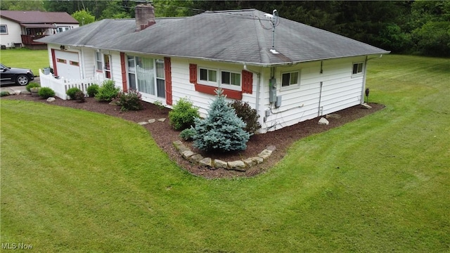 1781 Pleasant Valley Rd, Girard, OH 44420 - rear view of property with a yard, roof with shingles, and a chimney