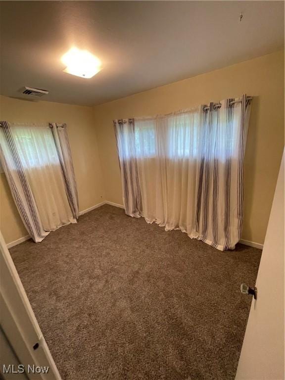 1781 Pleasant Valley Rd, Girard, OH 44420 - unfurnished room featuring dark carpet and baseboards