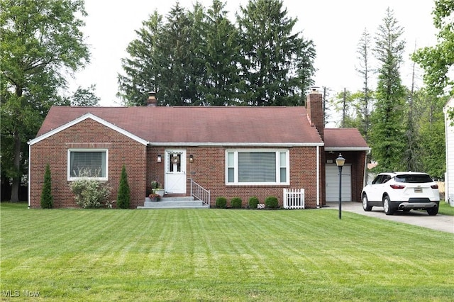 320 Brookfield Ave, Boardman, OH 44512 - view of front of house with brick siding, a chimney, and a front yard