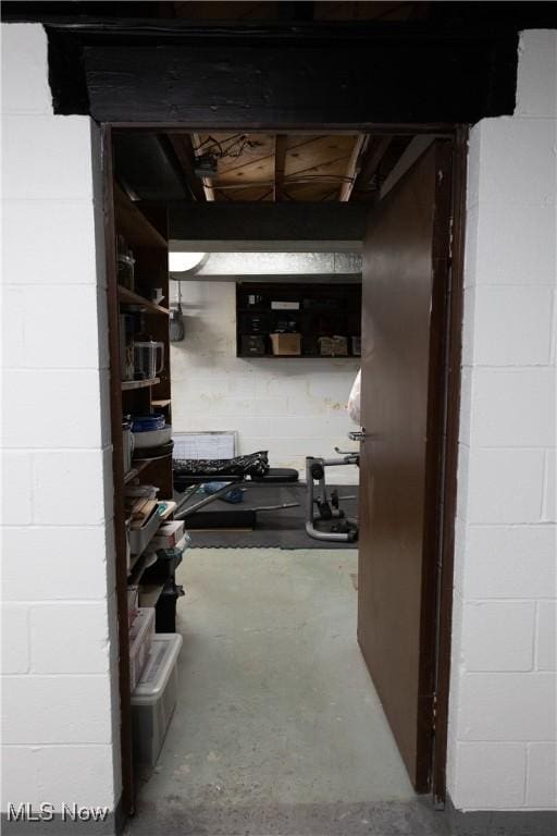 320 Brookfield Ave, Boardman, OH 44512 - hallway with unfinished concrete flooring and concrete block wall