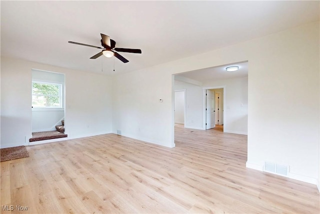 209 Beechwood Blvd, Wintersville, OH 43953 - empty room featuring a ceiling fan and light wood finished floors