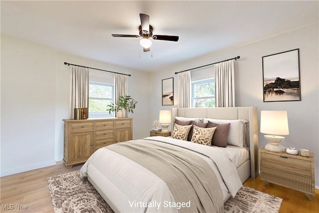 209 Beechwood Blvd, Wintersville, OH 43953 - bedroom with light wood-style floors and a ceiling fan