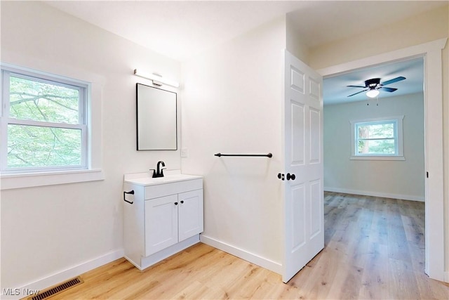 209 Beechwood Blvd, Wintersville, OH 43953 - bathroom with wood finished floors, vanity, and ceiling fan