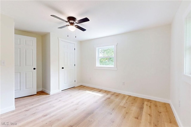 209 Beechwood Blvd, Wintersville, OH 43953 - unfurnished bedroom with light wood-type flooring, a closet, and ceiling fan