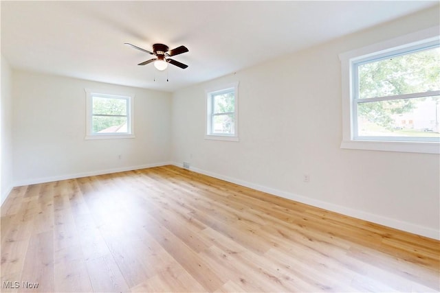 209 Beechwood Blvd, Wintersville, OH 43953 - empty room featuring plenty of natural light, light wood-style flooring, and ceiling fan