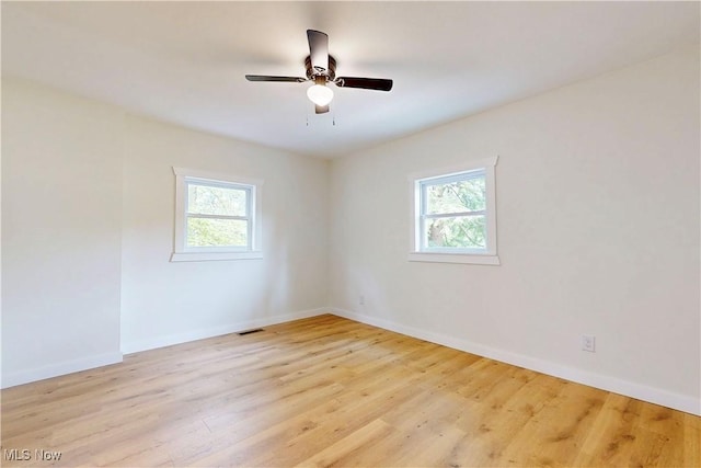 209 Beechwood Blvd, Wintersville, OH 43953 - unfurnished room featuring healthy amount of natural light, wood finished floors, and ceiling fan