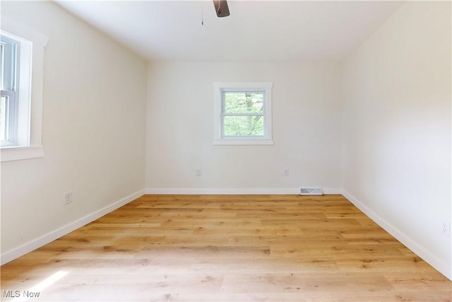 209 Beechwood Blvd, Wintersville, OH 43953 - empty room with a ceiling fan and light wood-style floors
