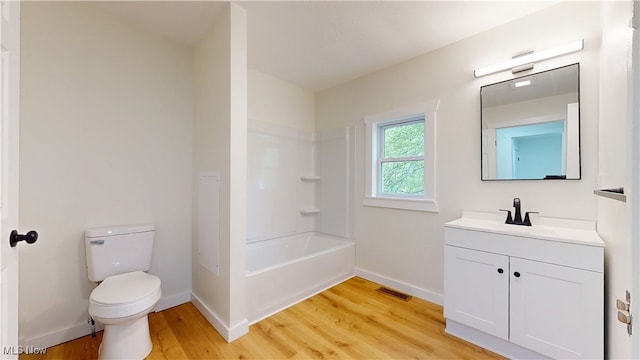 209 Beechwood Blvd, Wintersville, OH 43953 - bathroom with vanity, wood finished floors, and washtub / shower combination