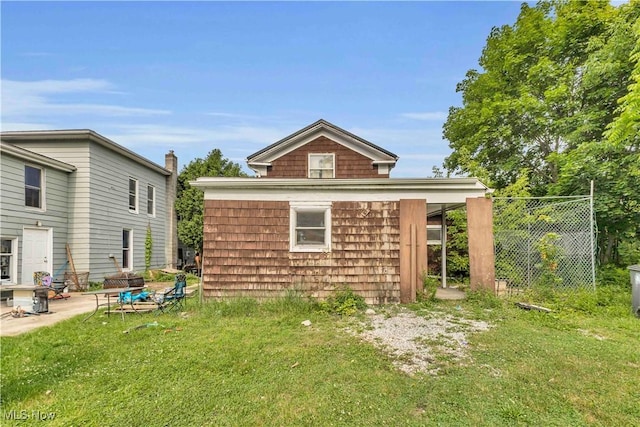 81 S Pleasant St, Oberlin, OH 44074 - rear view of property featuring a patio area