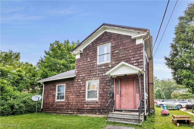 81 S Pleasant St, Oberlin, OH 44074 - view of front facade with entry steps and a front lawn