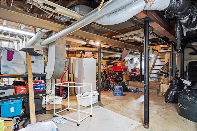 83 S Pleasant St, Oberlin, OH 44074 - unfinished basement with freestanding refrigerator