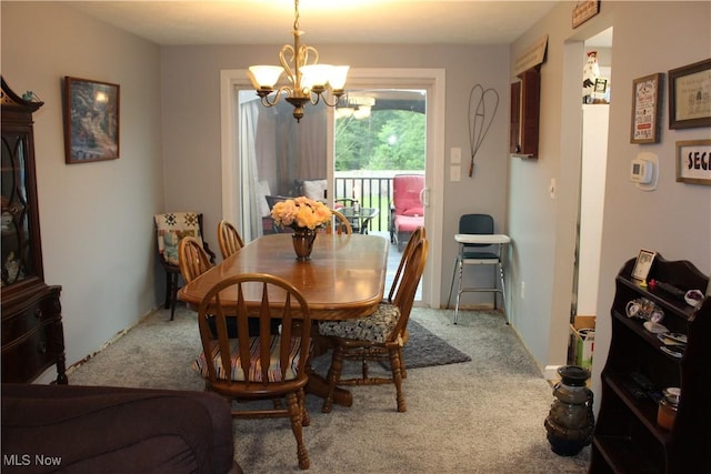2869 Wexford Blvd, Stow, OH 44224 - dining space featuring a chandelier and carpet flooring