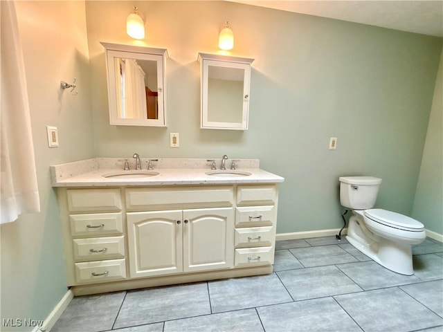 29123 Ridge Rd, Wickliffe, OH 44092 - full bath featuring double vanity and tile patterned flooring