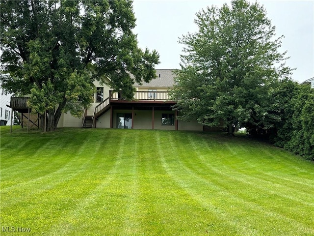 29123 Ridge Rd, Wickliffe, OH 44092 - view of green lawn featuring a deck and stairway