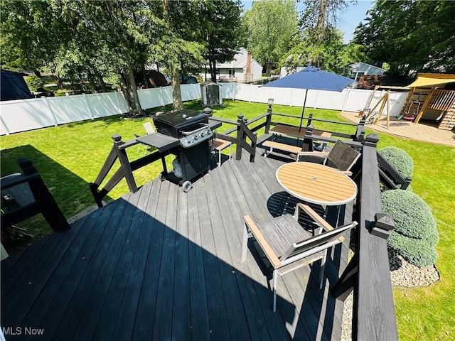 132 Dennis Dr, Cortland, OH 44410 - wooden terrace with a fenced backyard and grilling area